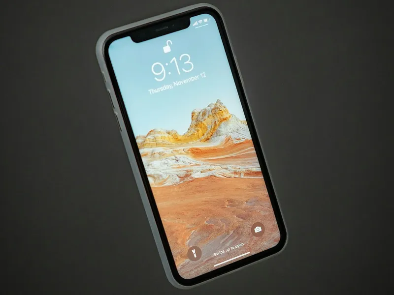 Commuter checking a phone on a train — why 10GB SIM only deals matter