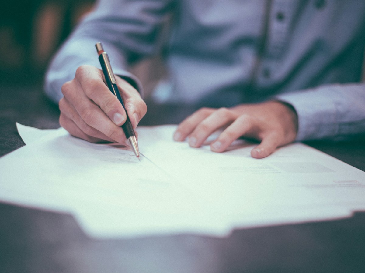 Household bills and paperwork on a table — energy price cap October 2026 context